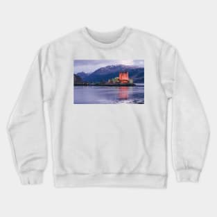 Eilean Donan Castle on a winter evening  in the Highlands of Scotland , Eilean Donan Castle is one of the finest Scottish castles for photography Crewneck Sweatshirt